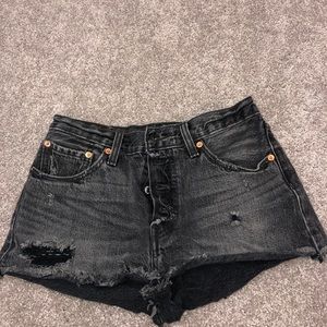 Levi’s black ripped jean shorts